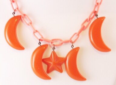 BN7 orange bakelite  moon/star necklace